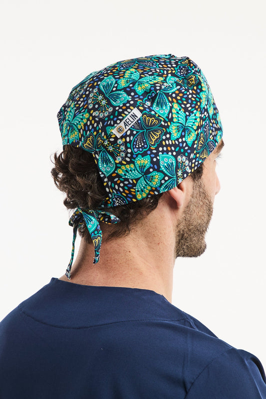 Calot médical Aelin bleu marine à motifs de papillons pour dentiste