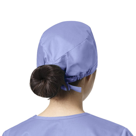 Femme en calot médical WonderWink bleu ciel, facile à entretenir, protège des contaminations