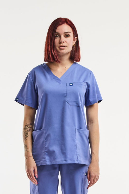 Tunique médicale bleue EMMA pour femme, idéale pour le secteur de la santé