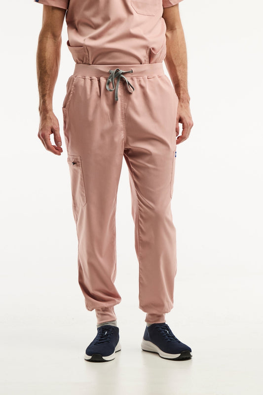 Pantalon médical jogger LUCA en rose clair pour homme, idéal pour le secteur médical