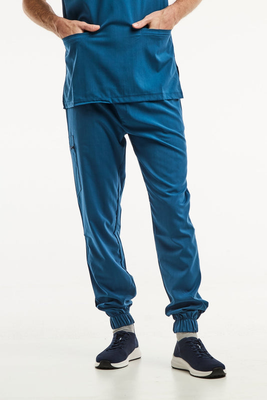 Pantalon médical bleu turquoise en coupe slimfit avec jogger pants