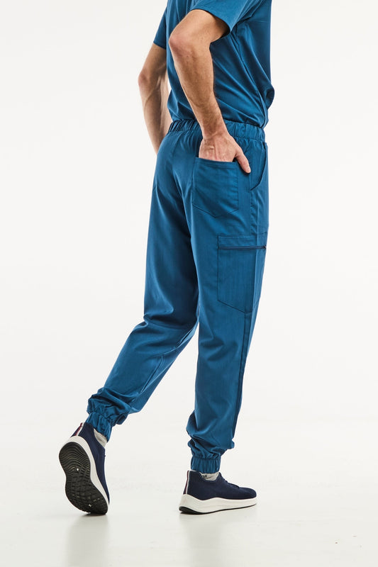 Pantalon médical bleu turquoise slimfit pour un look professionnel et moderne