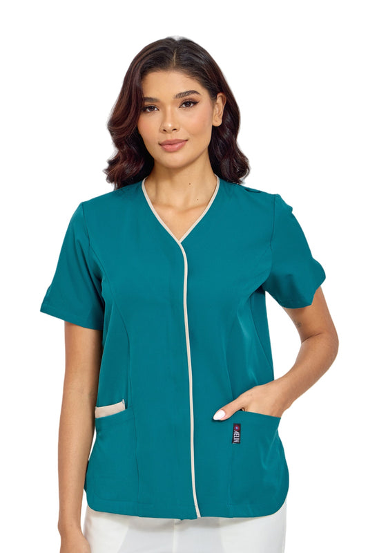 Alt texte d’une blouse médicale femme en vert turquoise avec blanc, poche et confort optimal