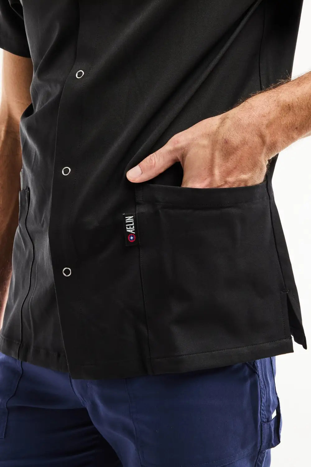 Blouse médicale homme noire col officier moderne, tissu technique stretch