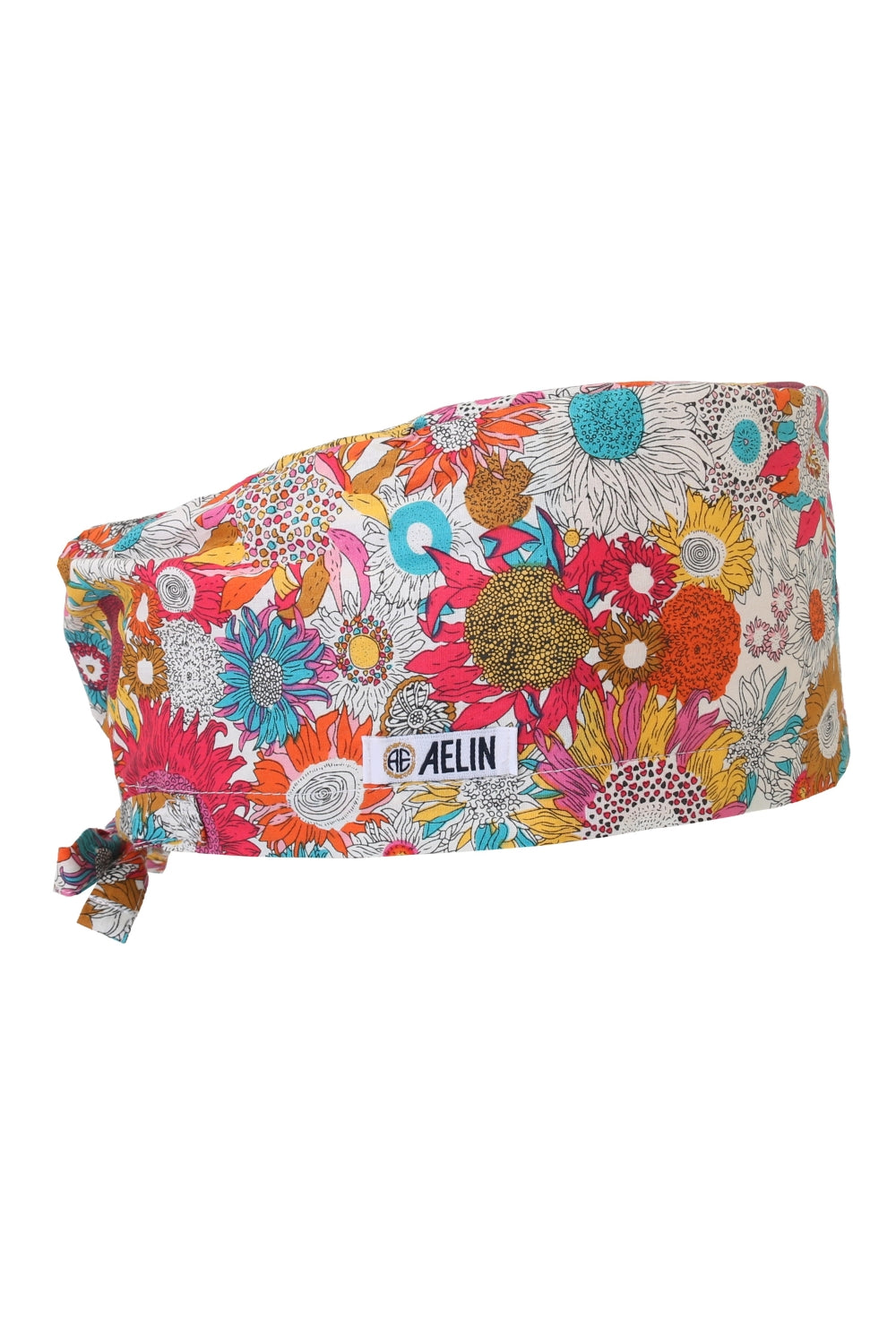 Calot médical floral coloré avec motif fleurs et étiquette de marque