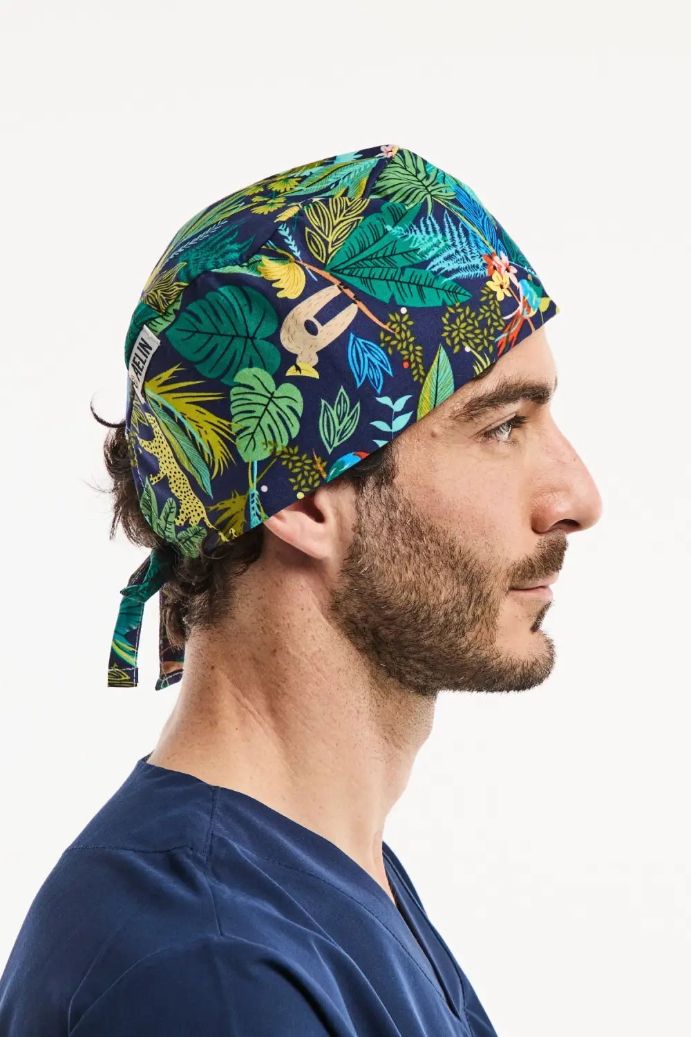 Calot médical Aelin bleu marine avec imprimé jungle pour un style unique en milieu dentaire