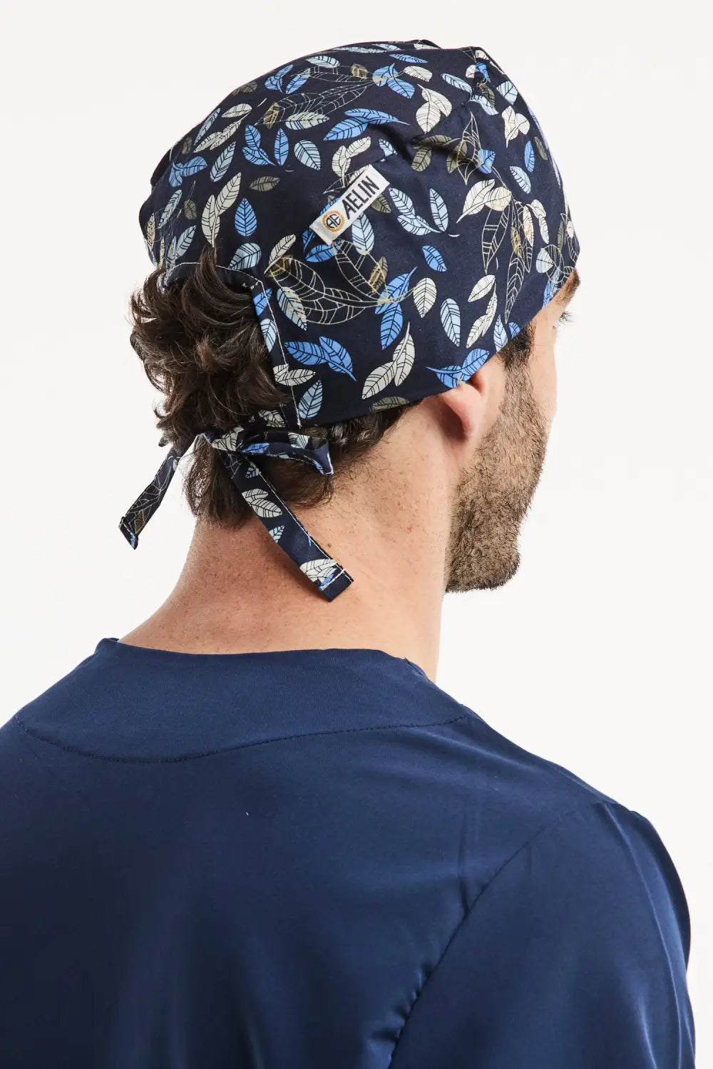 Calot médical Aelin bleu marine à motif feuilles pour professionnels de santé