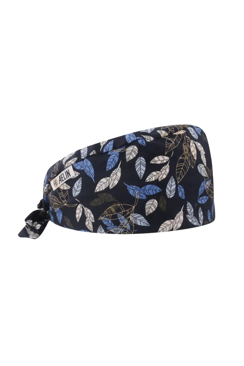 Calot médical Aelin bleu marine avec motif feuilles sur fond noir élégant
