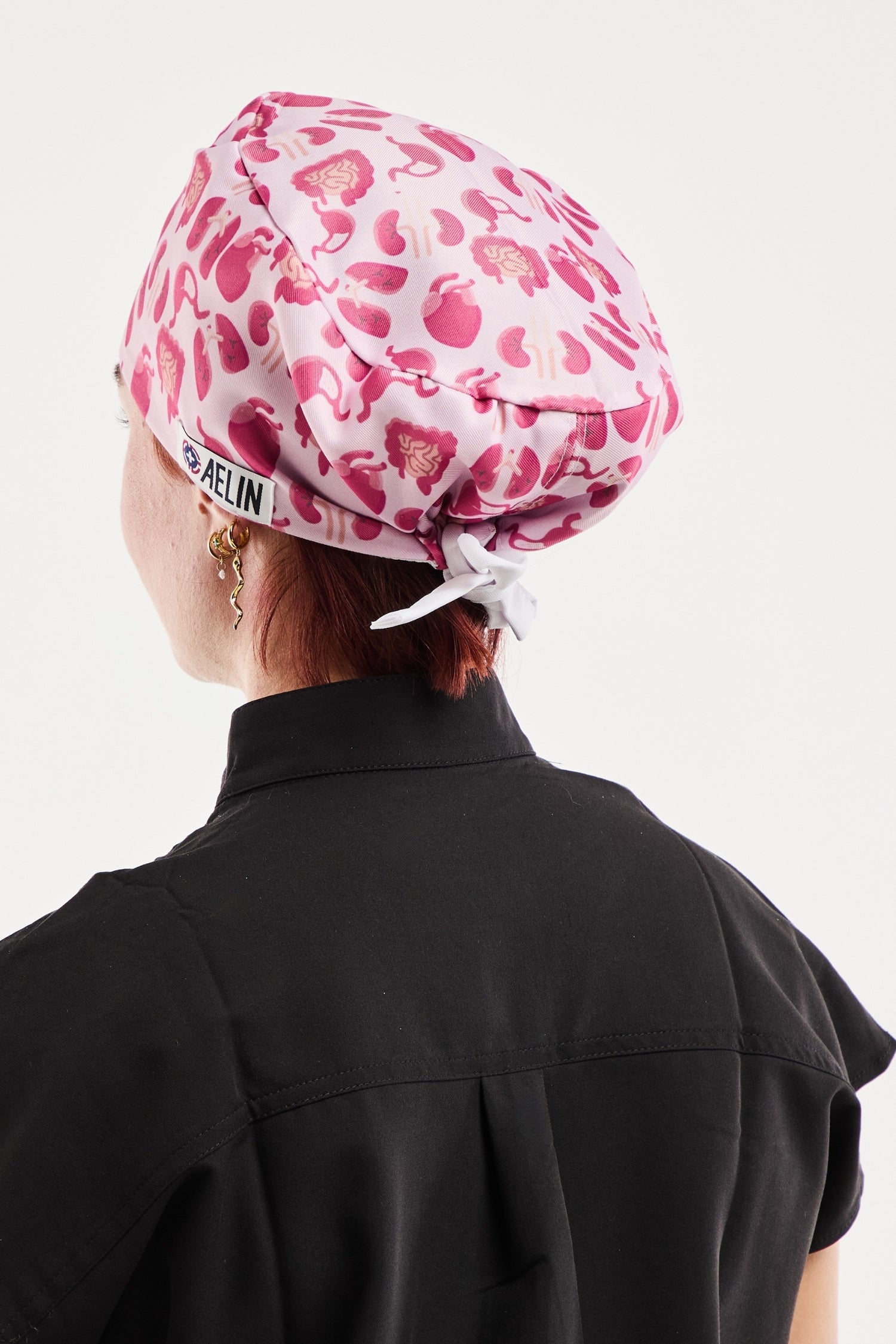 Calot médical rose collection Art Médical Aelin, bandana léopard rose avec nœud