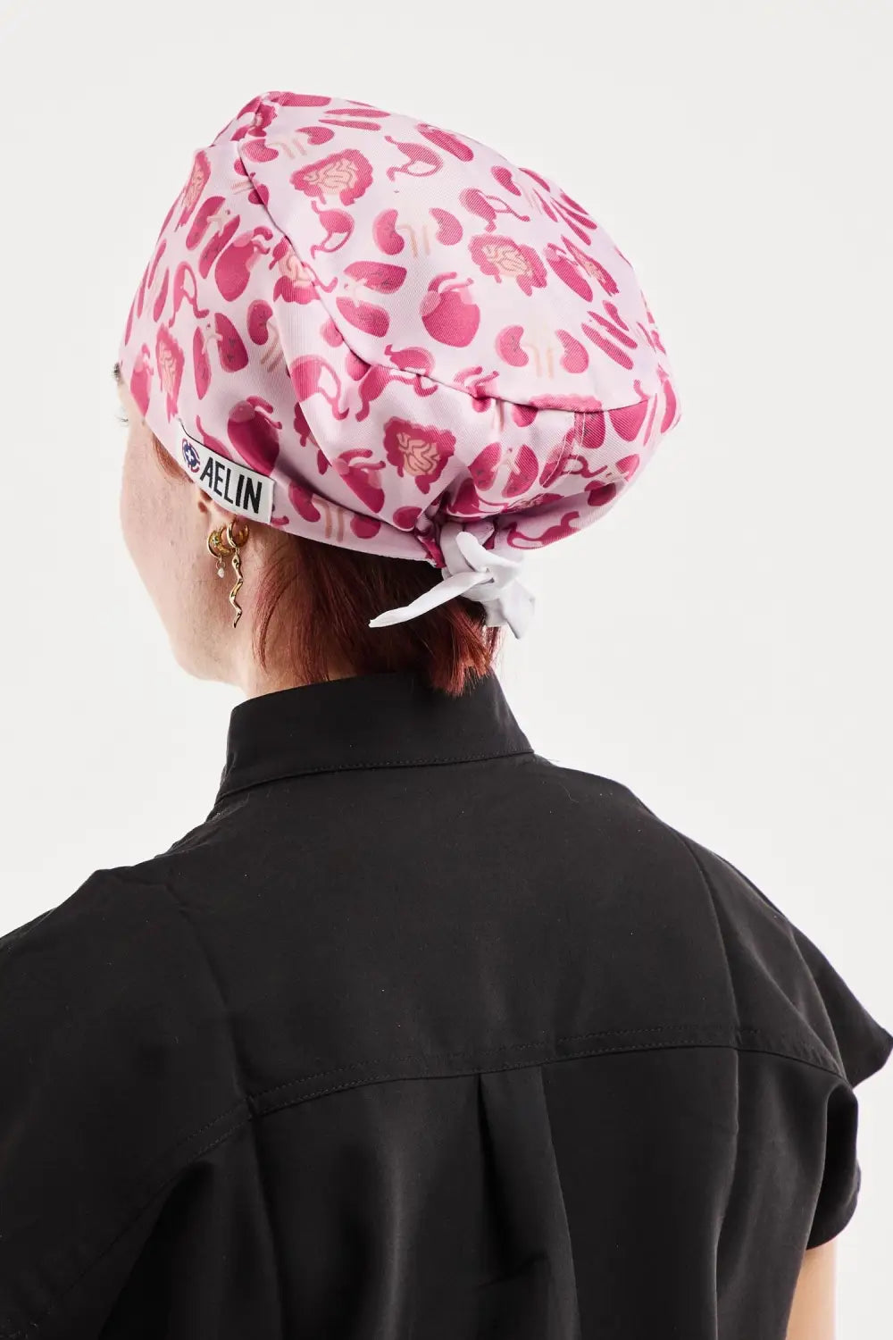 Calot médical rose collection Art Médical Aelin, bandana léopard rose avec nœud