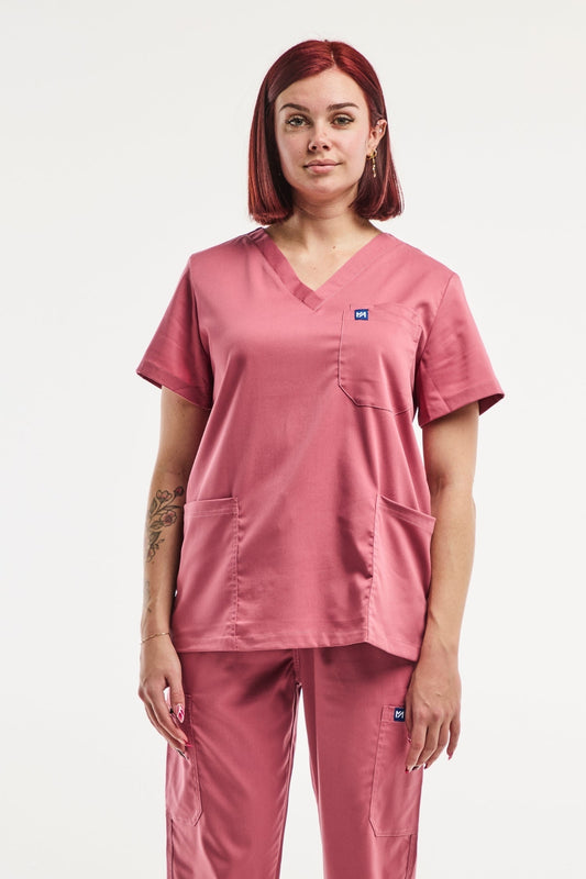 Tunique médicale col EMMA rose, idéale pour soigner avec style en milieu médical