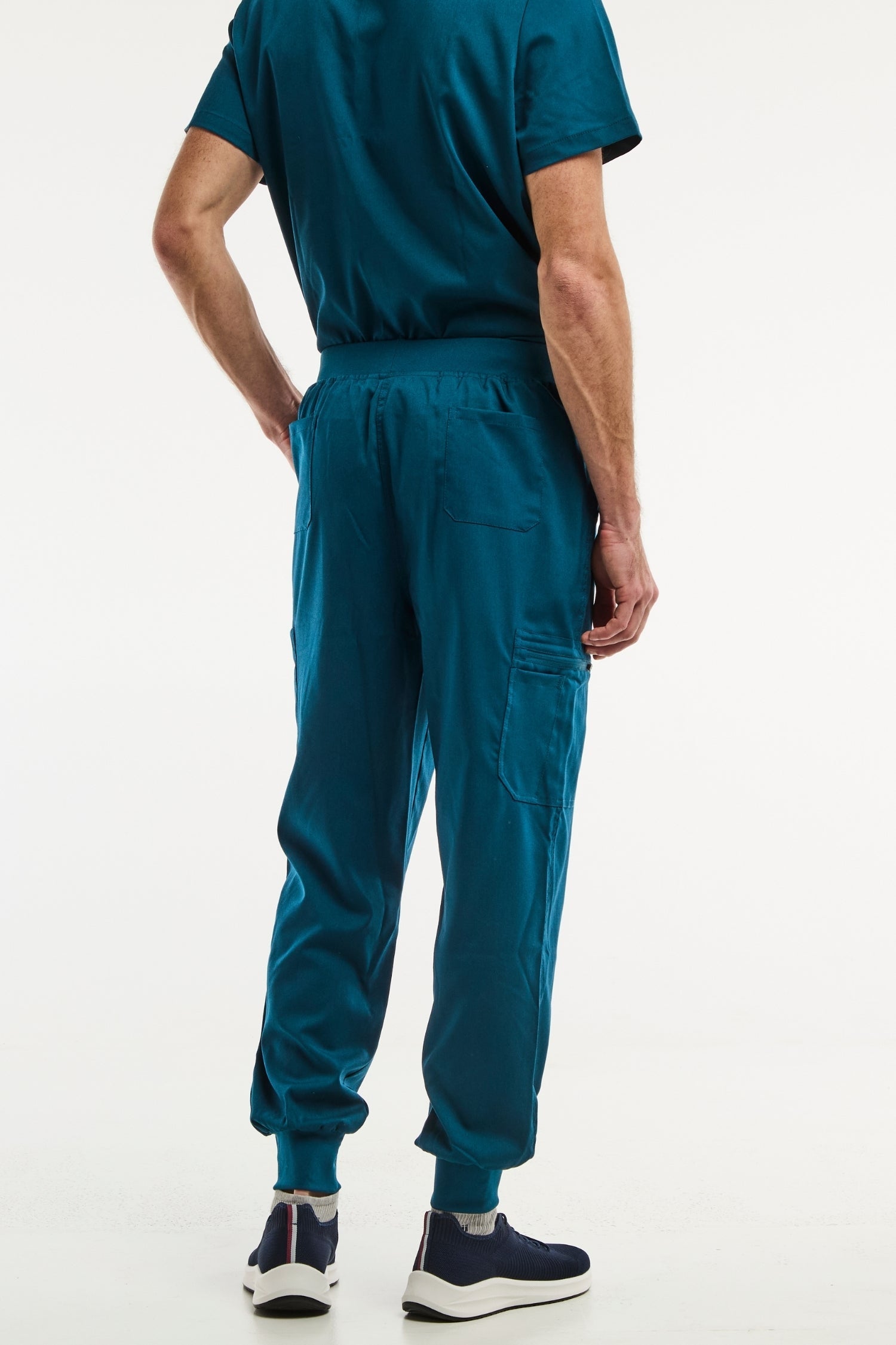 Pantalon médical jogger LUCA en teal pour homme, idéal pour un usage médical