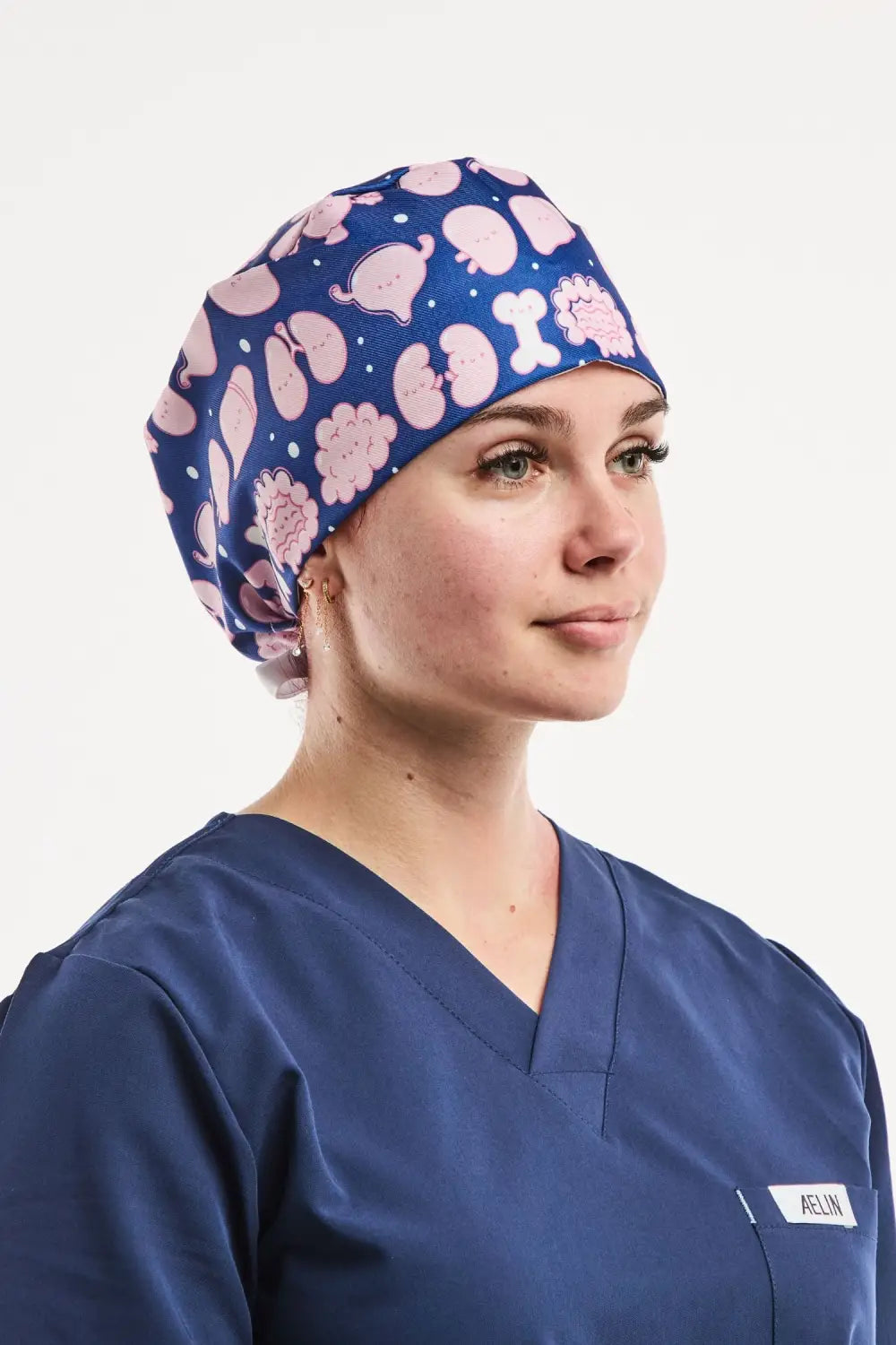 Pack découverte Aelin: casquette chirurgicale bleue taille courte avec organes et os roses