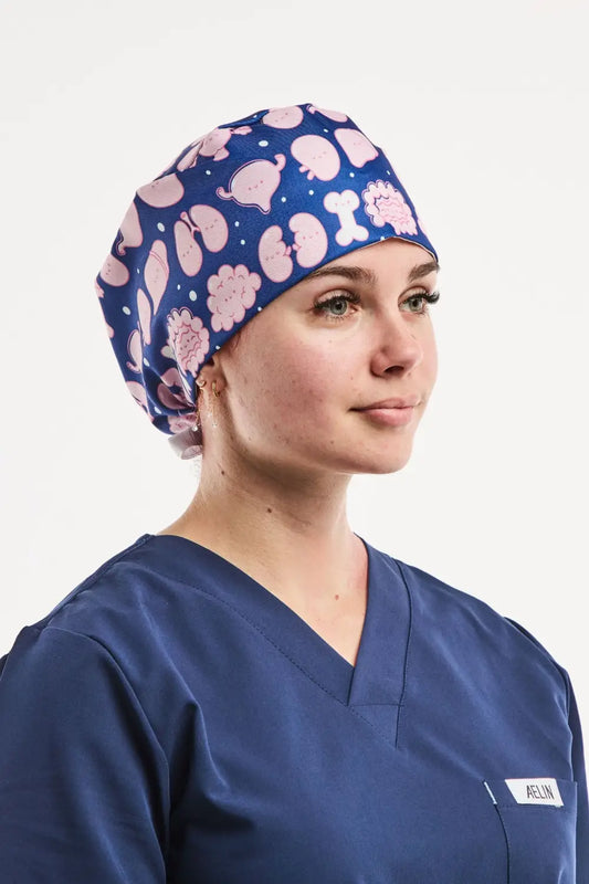 Pack découverte Aelin: casquette chirurgicale bleue taille courte avec organes et os roses