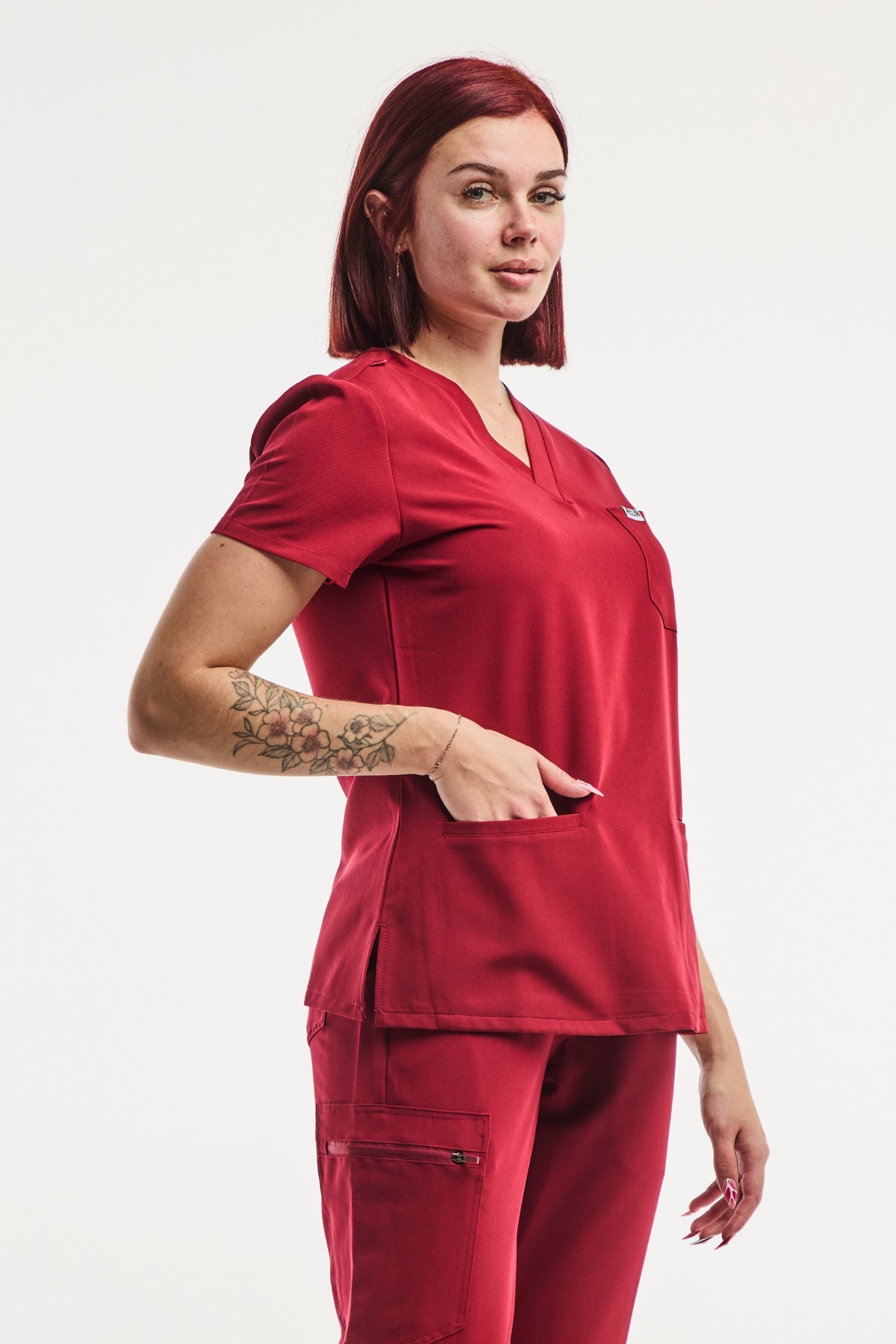 Tunique médicale Stretch 4 Voies pour femme en rouge, idéale pour le secteur médical