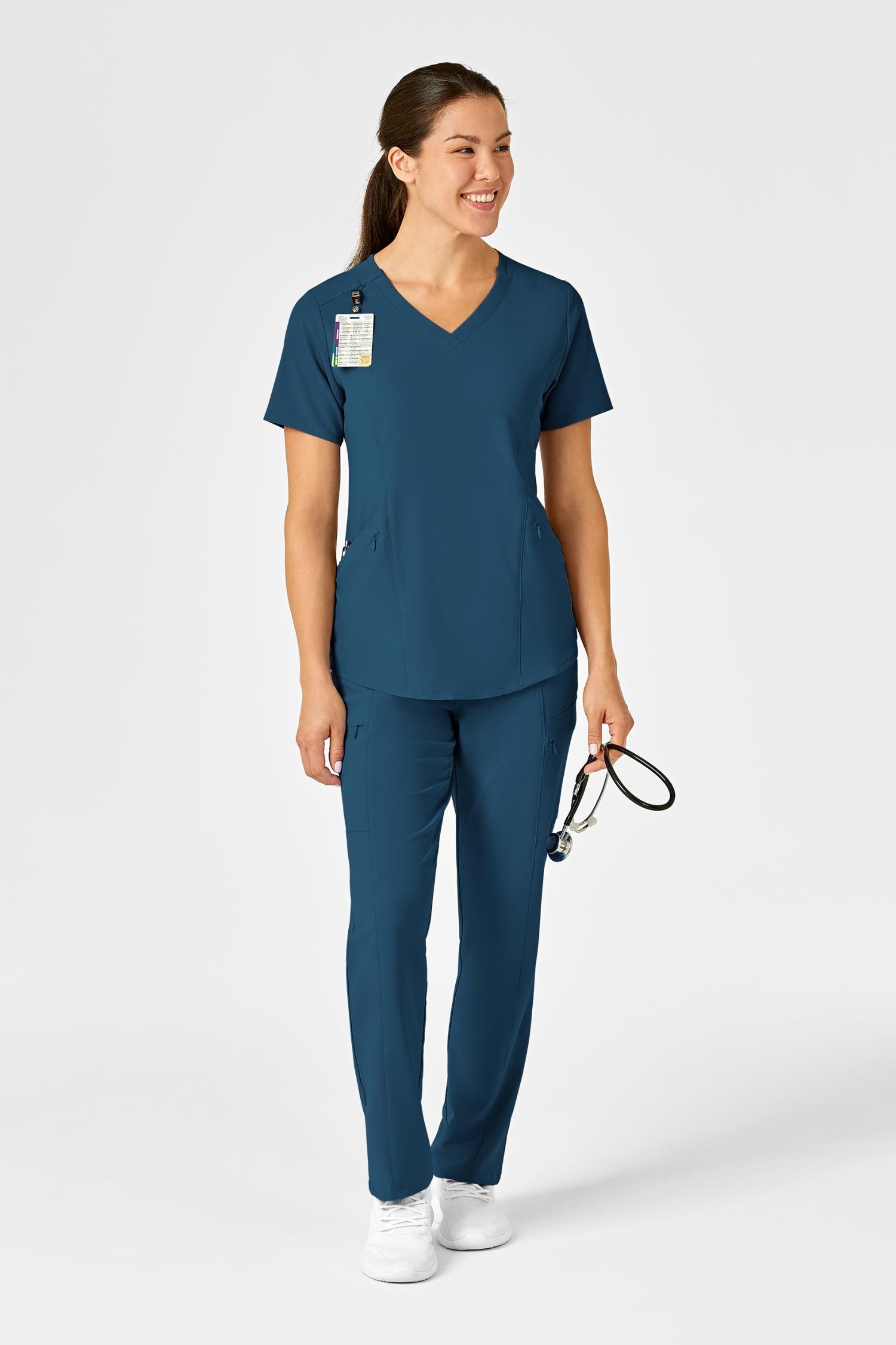 Femme en tenue médicale polyester spandex avec chien, poches à fermeture, bleu turquoise