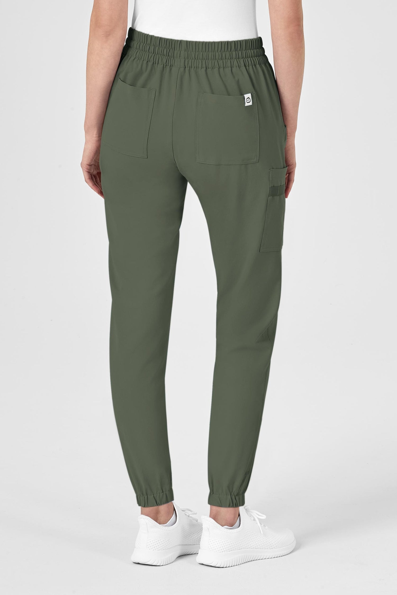 Pantalon cargo vert olive The North Face pour femme avec poches à fermeture, tenue médicale