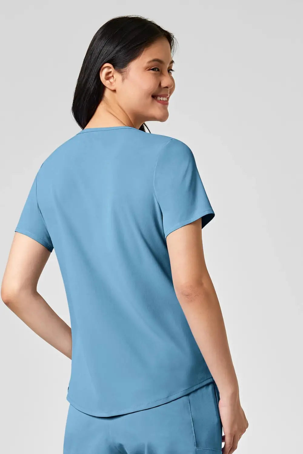 Femme en tenue médicale bleue, polyester spandex, uniforme Renew