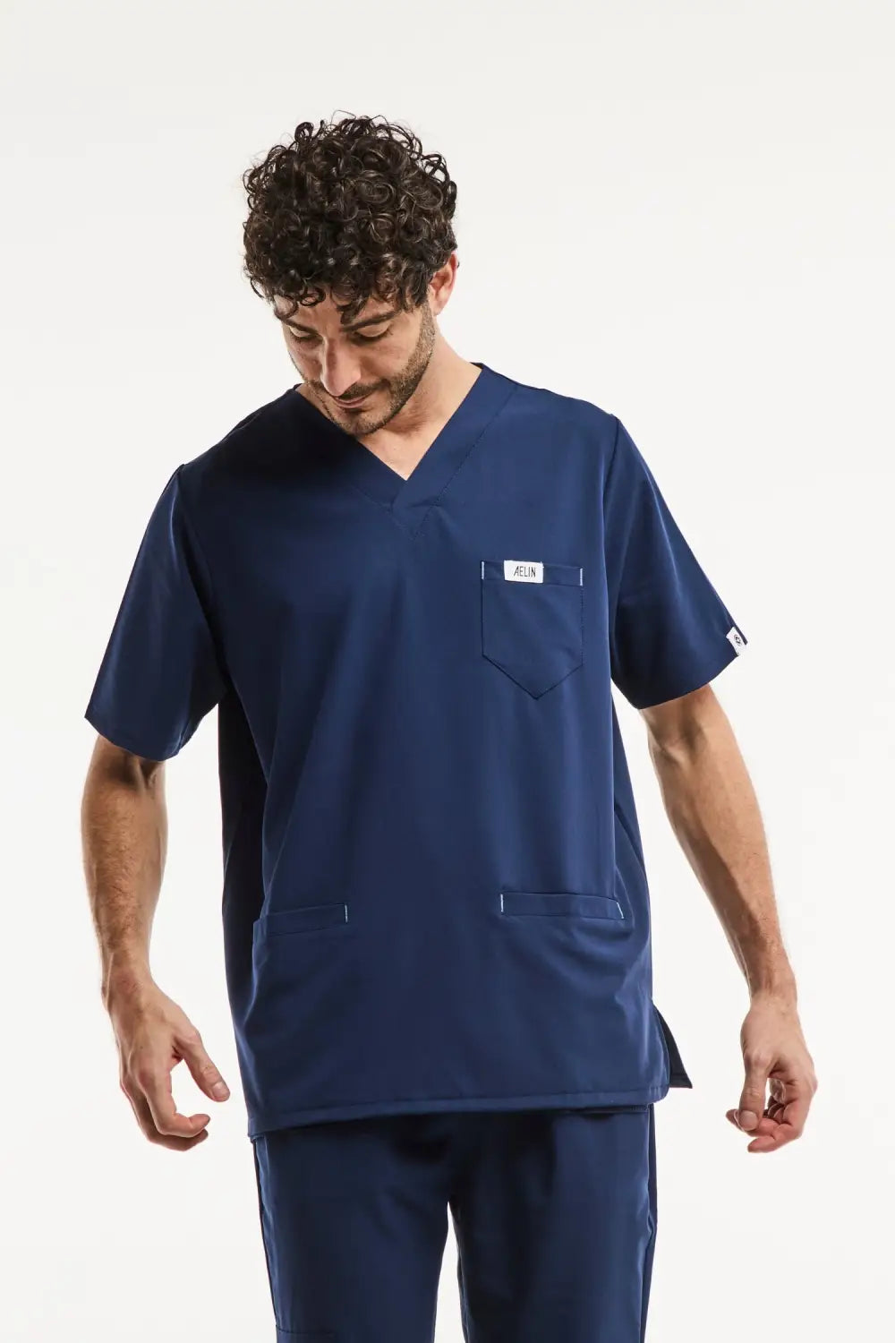 Uniforme médical bleu marine Slimfit pour homme composé d’une blouse et pantalon assortis