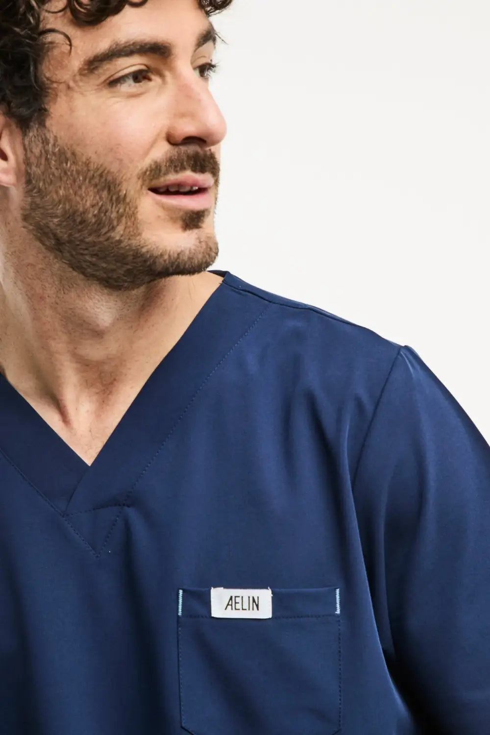 Tunique médicale bleu marine pour homme en slimfit, parfaite pour les uniforms