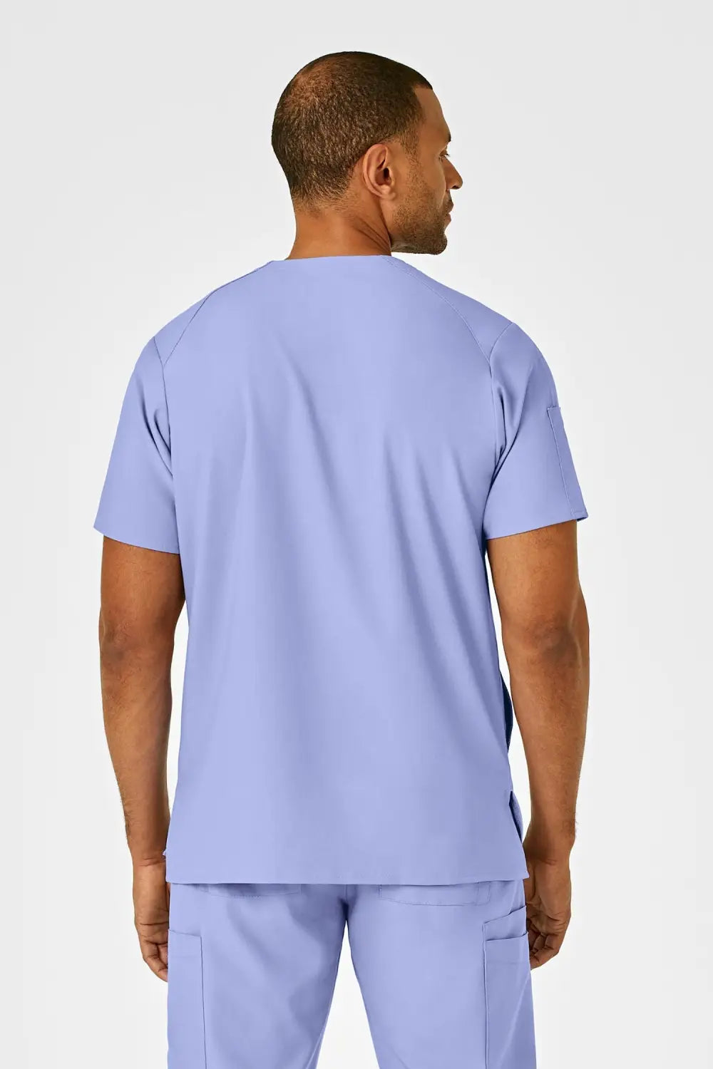 Tenue médicale complète avec un dessus de médecin violet clair vu de derrière